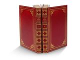 un livre ouvert, à la couverture rouge, posé sur une surface blanche