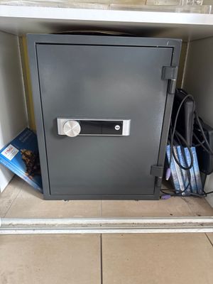 a safe box that is open on the floor
