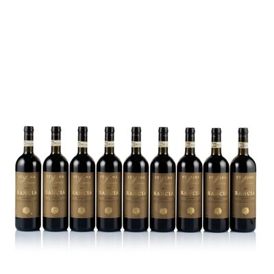 six bottles of red wine lined up in a row