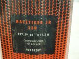 a close up of a black and orange box with a label on it