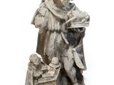une statue représentant un homme tenant un enfant et un chien dans ses bras