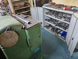 many tools on the shelves in the garage