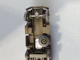 a toy car that is sitting on a white surface