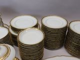 a lot of plates that are sitting on a table