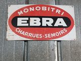 a sign that says ebra on the side of a building