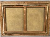 an old picture of a window with a wooden frame and a window pane