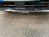 a close up of the front bumper of a car