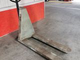 a fork on a pallet in a garage