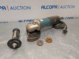a close up of an electric tool on a table
