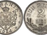 une pièce d'argent surmontée d'une couronne
