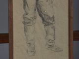 drawing of a pair of boots on a shelf next to a framed picture