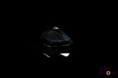 an image of a black diamond in the dark