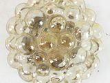 a glass plate with a flower design on it