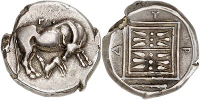 a close up of a silver coin with a horse on it