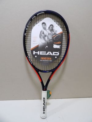 a tennis racket with a picture of a man and a woman on it