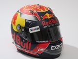 the helmet of a red bull racing driver on a white background