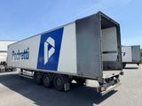 a semi truck that is parked in a parking lot