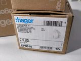 two boxes of new and unused hager products sitting on a table