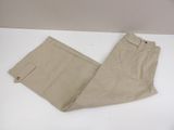 a pair of beige pants sitting on top of a white table