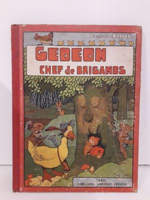 un vieux livre pour enfants illustré d'un canard et d'un caneton dans les bois