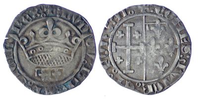 une pièce d'argent avec une couronne au recto et une couronne au verso