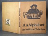 an alphabet book with a picture of a man in a car