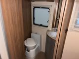 a small bathroom with a toilet and a sink in it