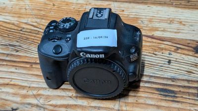 a camera that is sitting on a wooden table