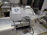 a picture of a kitchen with a large machine on the counter