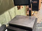 a computer desk with a monitor and a laptop on top of it