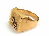 an image of a gold ring with a roman numeral on it
