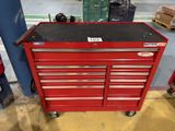 an image of a red tool cabinet in a warehouse