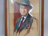 painting of a man in a suit and hat in a wooden frame