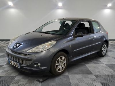 a picture of a grey car parked in a garage