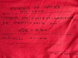 an image of a red cloth with writing on it