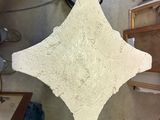a picture of a sculpture of a sting ray in a workshop