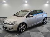 a picture of a silver car parked in a garage