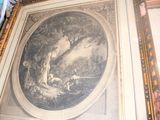 une image d'un tableau accroché au mur d'une pièce