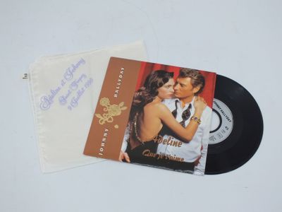 un album dont la pochette représente un homme embrassant une femme