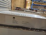 a box that is sitting on top of a conveyor belt