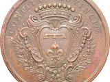 Gros plan sur une pièce de monnaie ornée d'une couronne