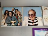 three pictures of a man with sunglasses on a wall