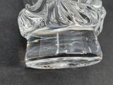 a clear glass vase with a decorative design on it