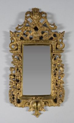 a mirror that is hanging on the wall in the room