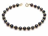 a black pearl bracelet with a gold plated clasp