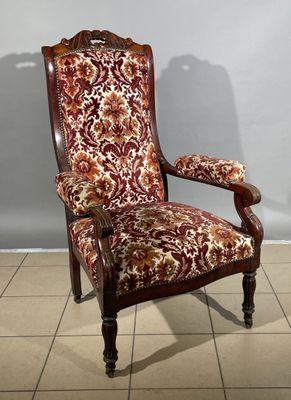 an image of a chair with a floral upholstered upholstered seat