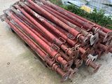 a pile of old rusty pipes sitting on the ground
