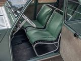 a green seat in the back of a green car