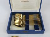 an image of a set of six gold plated spoons and spoons