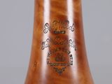 a close up of a bell on a table